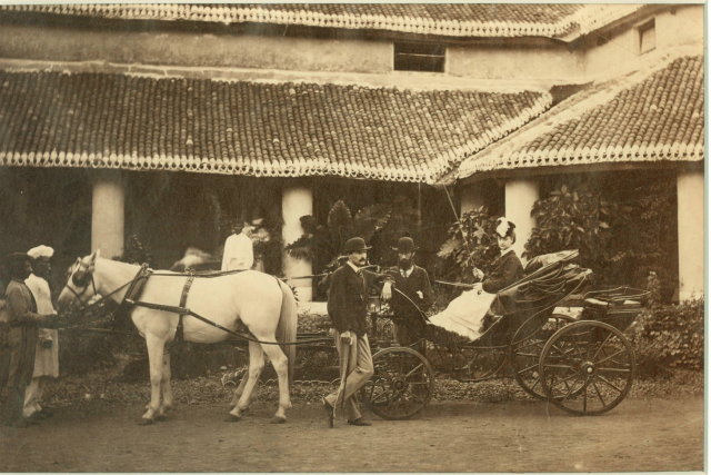 British_family_in_India_in_front_of_their_house_in_1875
